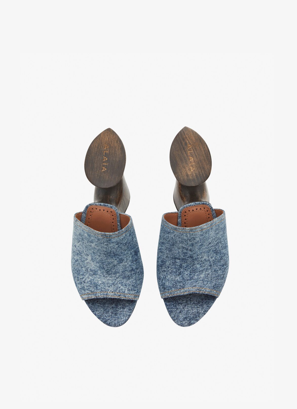 La Sculpture mules in denim and wood ALAÏA BLUE JEANS LA SCULPTURE MULES IN DENIM AND WOOD